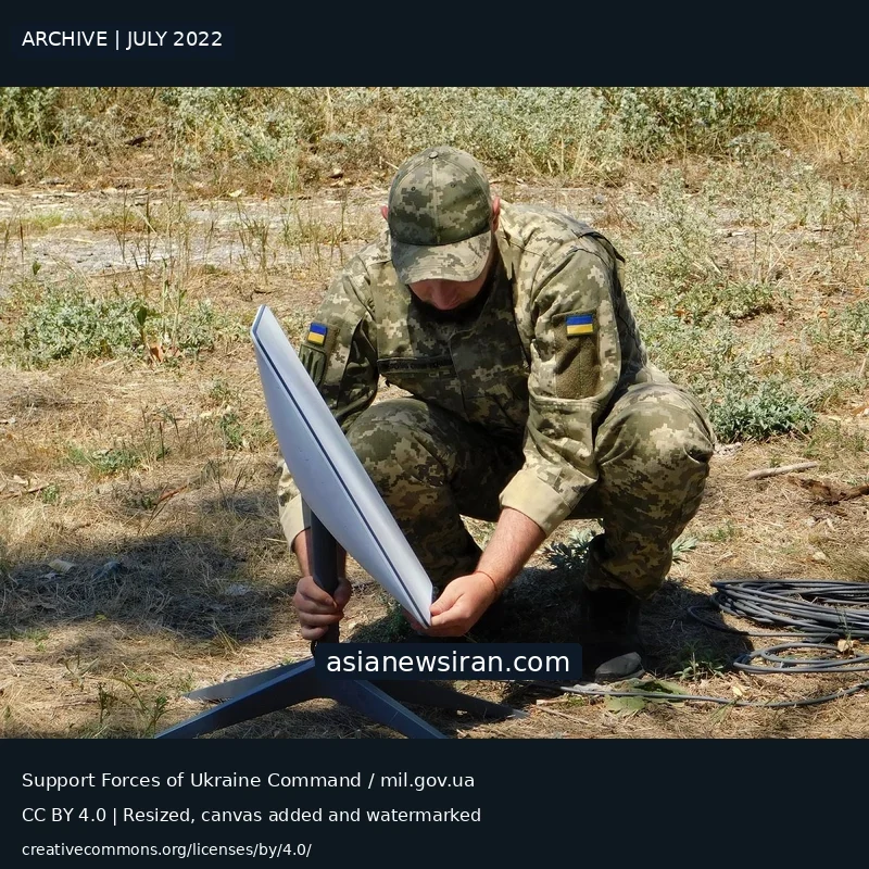 Archive photo from July 2022 of a Ukrainian Support Forces soldier installing a Starlink terminal
