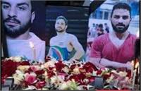 محل دفن نوید افکاری گلباران شد/مردم شعار «نوید قهرمان» سر دادند