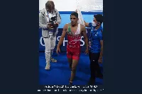 کشتی رحمان عموزاد و تیوانیان در جهانی ۲۰۲۶؛ جزئیات پایان دیدار